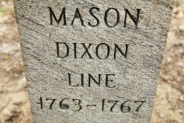 In this Friday, April 15, 2011, photo  in Newark Del., shown is a post marking the base point in the survey of Charles Mason and Jeremiah Dixon.  Mason and Dixon began their survey a century before the Civil War to settle a border dispute between Pennsylvania and Maryland.  (AP Photo/Matt Rourke)