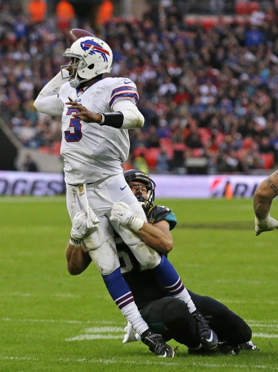 Buffalo Bills quarterback EJ Manuel (3) is sacked during the NFL game between Buffalo Bills and Jacksonville Jaguars at Wembley Stadium in London,  Sunday, Oct. 25, 2015. The Jaguars won 34-31. (AP Photo/Matt Dunham)