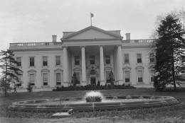 The White House in Washington, D.C., on April 22, 1931. When the American flag flies from the masthead, it means the president is at home, but when it is not, it means the president is away. (AP Photo)