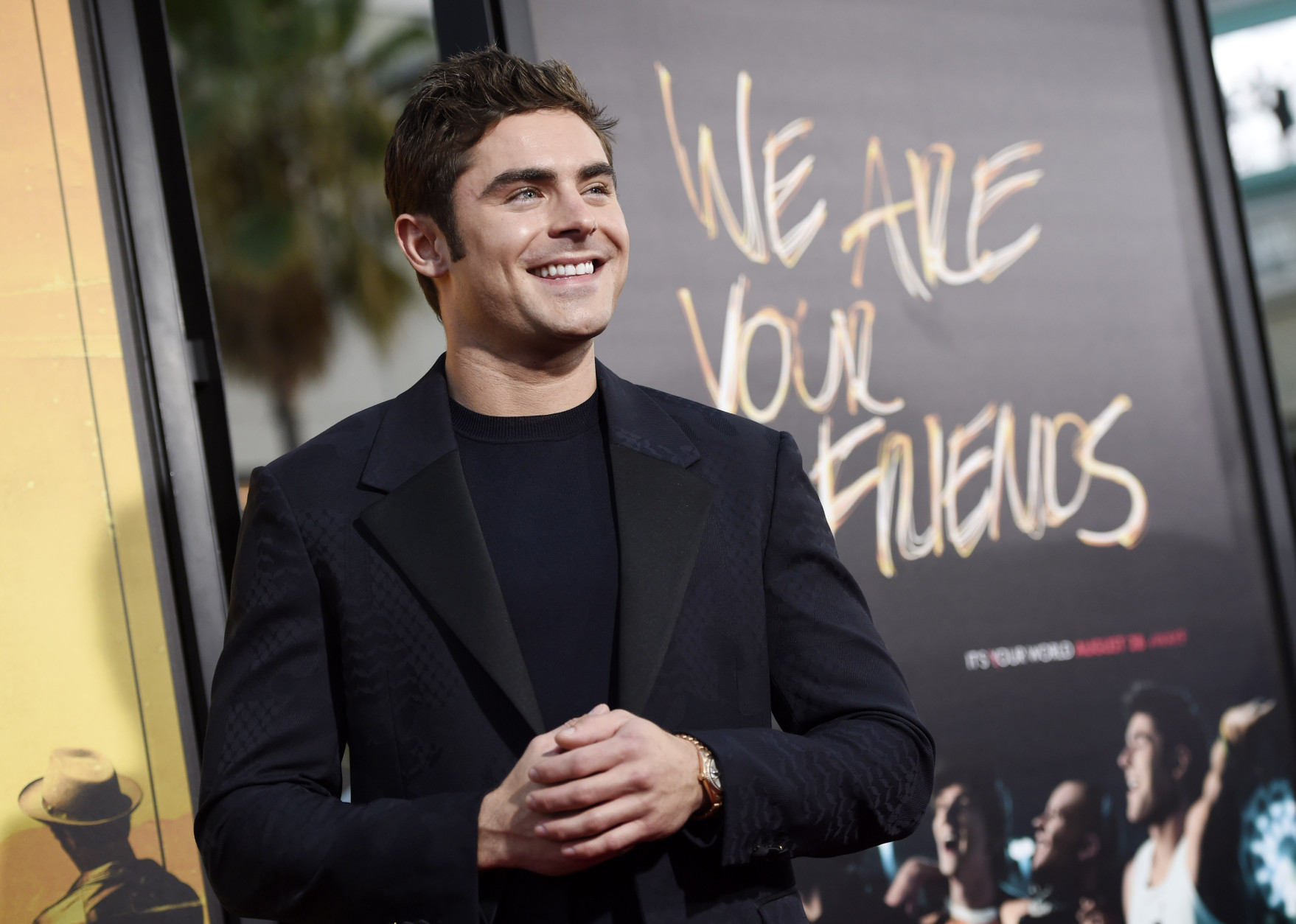 Zac Efron, a cast member in "We Are Your Friends," poses at the premiere of the film at the TCL Chinese Theatre on Thursday, Aug. 20, 2015, in Los Angeles. (Photo by Chris Pizzello/Invision/AP)