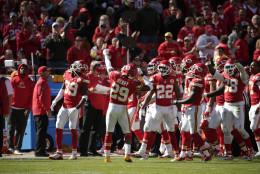 Kansas City Chiefs defensive back Eric Berry (29) celebrates with teammates and spectators after he intercepted a ball from Pittsburgh Steelers quarterback Landry Jones (3) for a turnover during the second half of an NFL football game in Kansas City, Mo., Sunday, Oct. 25, 2015. (AP Photo/Charlie Riedel)