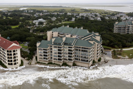 Erosion threatens the Ocean Club condos on Isle of Palms, S.C., Monday, Oct. 5, 2015. This condo has continually had erosion problems for several years. The current storm has made the problem worse.  The Charleston and surrounding areas are still struggling with flood waters due to a slow moving storm system. (AP Photo/Mic Smith)
