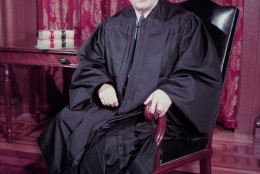 Chief Justice of the United States Supreme Court Earl Warren poses for a formal portrait in December 1953.  (AP Photo)