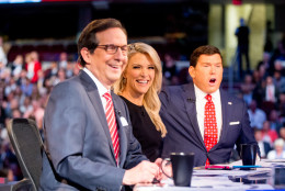 Fox News moderators from left, Chris Wallace, Megyn Kelly and Bret Baier speak to the camera before Republican presidential candidates New Jersey Gov. Chris Christie, Sen. Marco Rubio, R-Fla., Ben Carson, Wisconsin Gov. Scott Walker, Donald Trump, former Florida Gov. Jeb Bush, former Arkansas Gov. Mike Huckabee, Sen. Ted Cruz, R-Texas, Sen. Rand Paul, R-Ky., and Ohio Gov. John Kasich take the stage for the first Republican presidential debate at the Quicken Loans Arena, Thursday, Aug. 6, 2015,  in Cleveland. (AP Photo/Andrew Harnik)