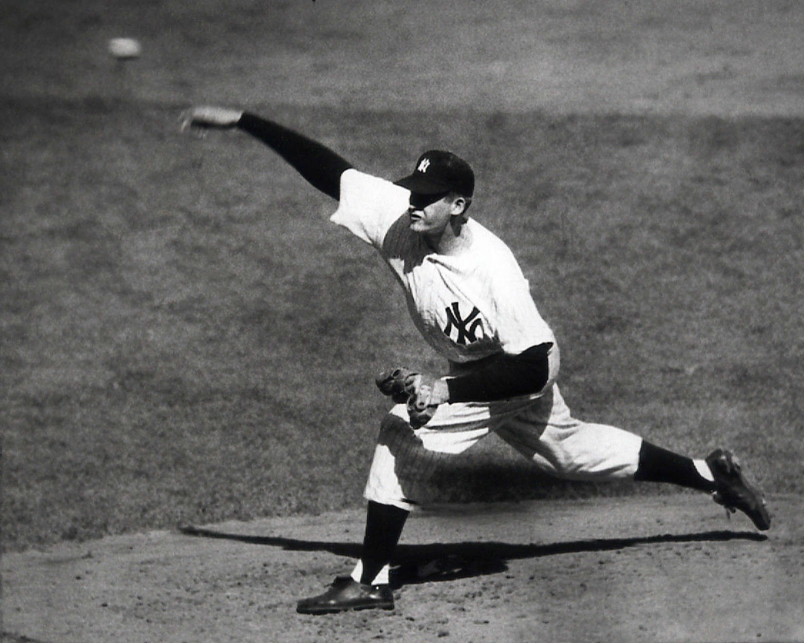 FILE - This Oct. 8, 1956, file photo, shows New York Yankees pitcher Don Larsen throwing against the Brooklyn Dodgers, enroute to a perfect game in the fourth inning of Game 5 of the World Series, in New York. Roy Halladay threw the second no-hitter in postseason history, leading the Philadelphia Phillies over the Cincinnati Reds 4-0 in Game 1 of the NL division series on Wednesday, Oct. 6, 2010. Larsen is the only other pitcher to throw a postseason no-hitter.  (AP Photo/File)