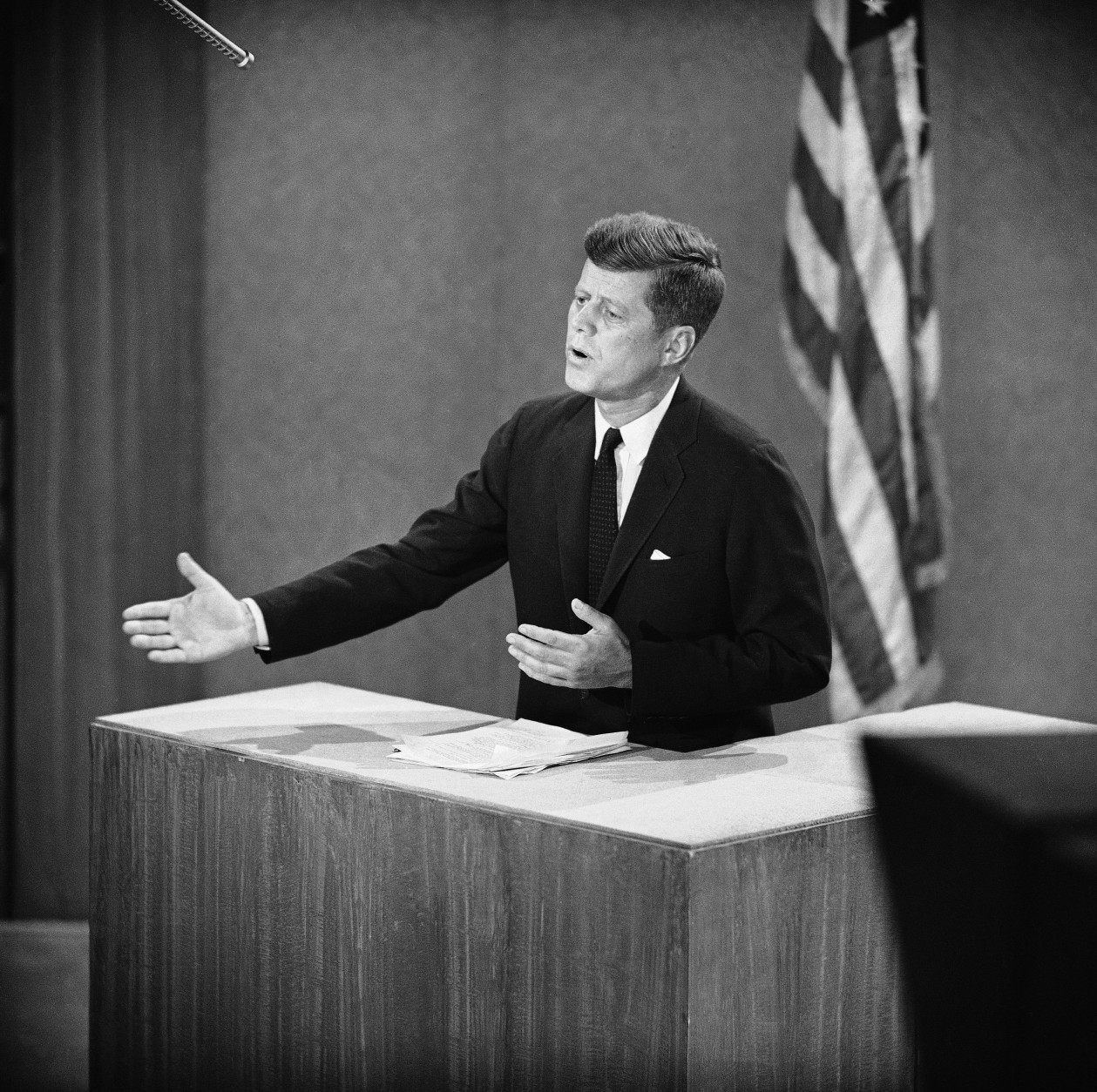 Sen. John F. Kennedy gestures during third session of the great debate with vice President Richard M. Nixon. This picture was made in a New York television studio, Oct. 13, 1960, where Kennedy appeared while Nixon was televised from Los Angeles. (AP Photo)