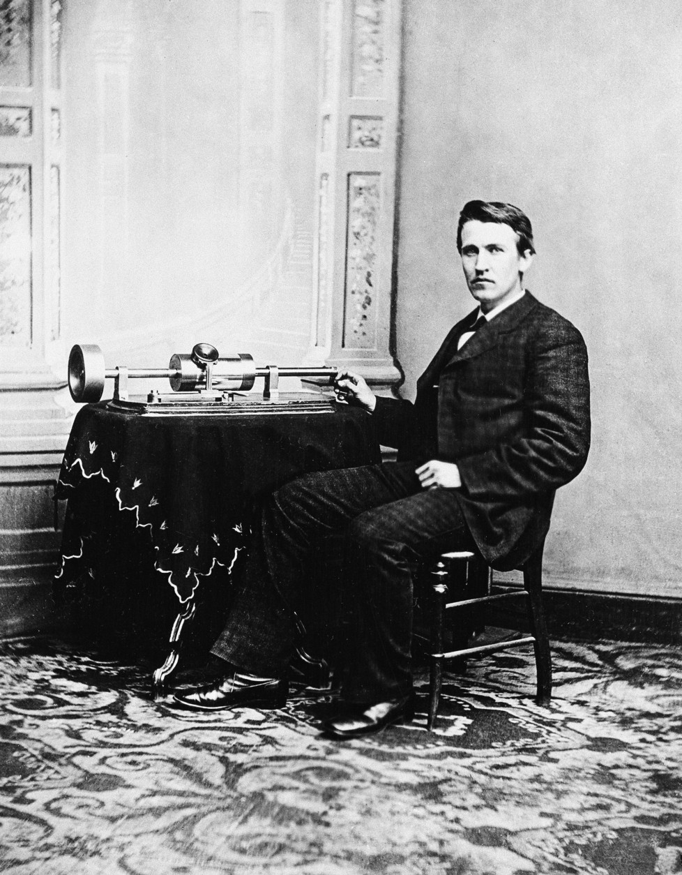 Thomas A. Edison poses with the the tin-foil phonograph, which he exhibited at the National Academy of Science in Washington and later demonstrated for the president at the White House, on April 18, 1878.  The phonograph, Edison's favorite invention, was invented on Aug. 12, 1877.  (AP Photo)