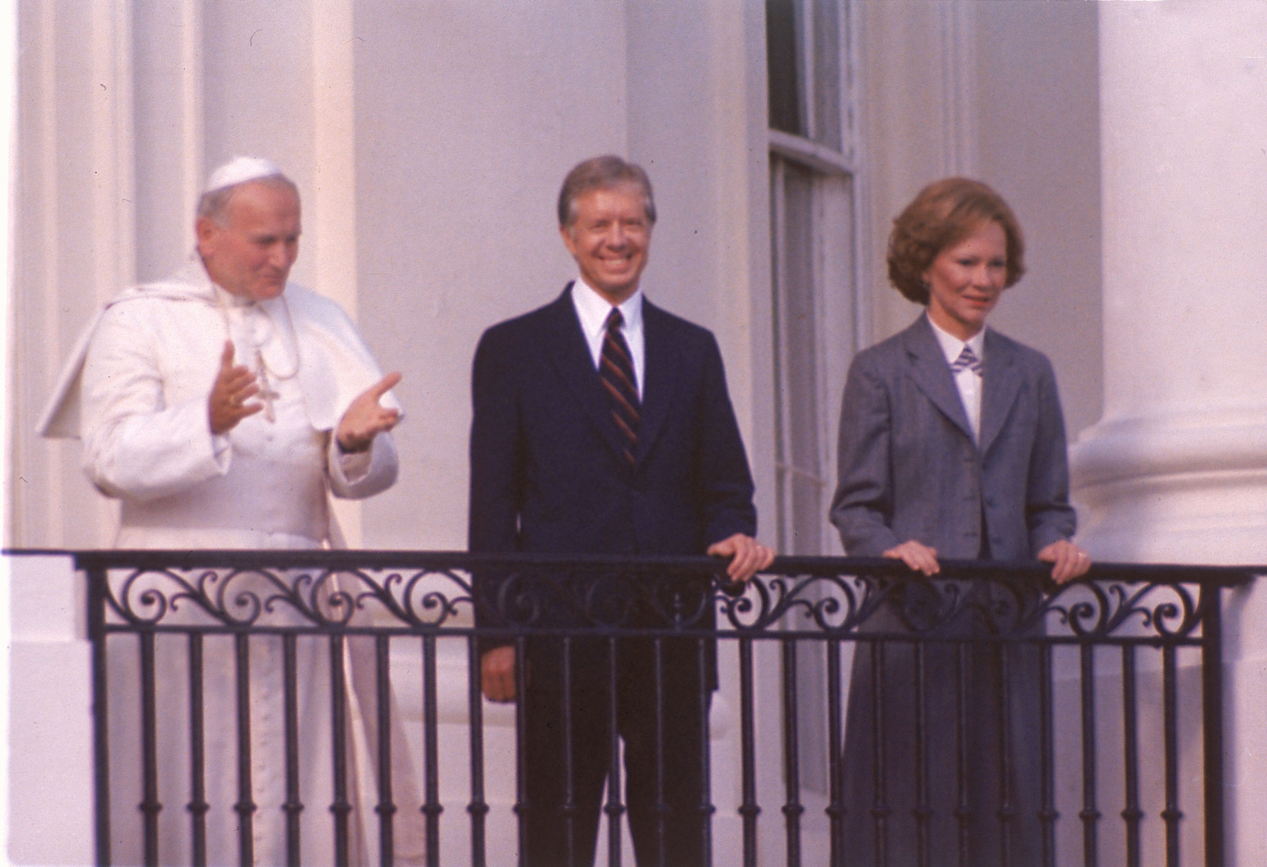 Pope John Paul II stands on the balcony of the White House with  President Jimmy Carter and first lady Rosalynn Carter in Washington, D.C., on Oct. 6, 1979.  (AP Photo)