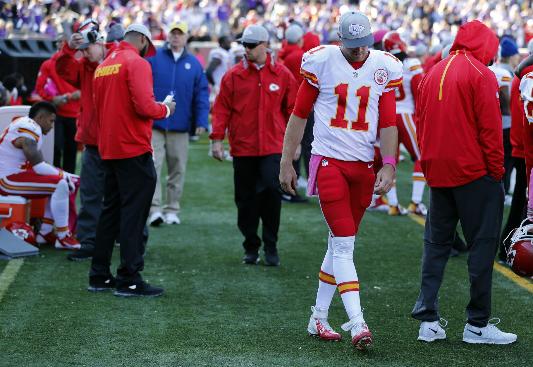 Kansas City Chiefs quarterback Alex Smith (11) walks on the sidelines during the second half of an NFL football game against the Minnesota Vikings, Sunday, Oct. 18, 2015, in Minneapolis. The Vikings won 16-10. (AP Photo/Jim Mone)