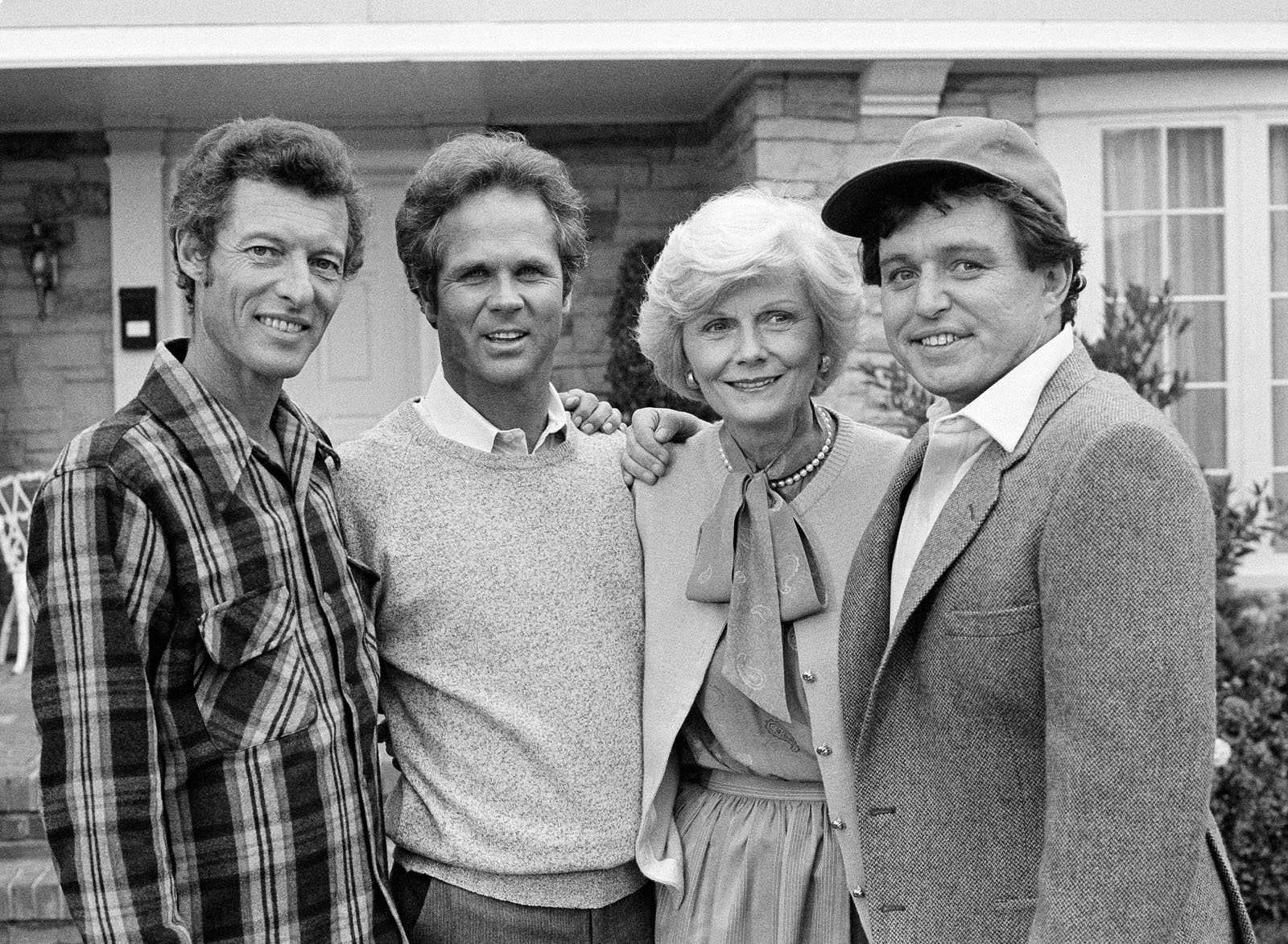 Members of the original cast of the "Leave It To Beaver" television series pause during filming of an upcoming TV special, "Still The Beaver," in Los Angeles on Dec. 10, 1982. From left to right are Ken Osmond, Tony Dow, Babara Billingsley and Jerry Mathers. Osmond died May 18, 2020. He was 76. (AP Photo/Wally Fong)