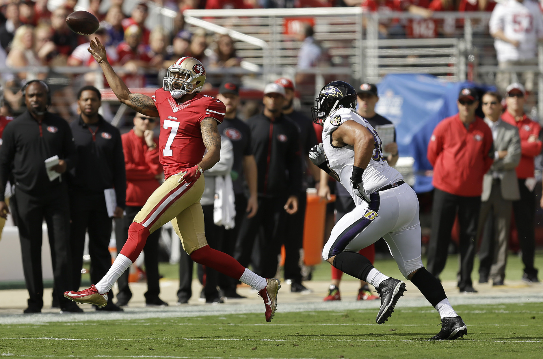 San Francisco 49ers quarterback Colin Kaepernick (7) throws against the Baltimore Ravens during the first half of an NFL football game in Santa Clara, Calif., Sunday, Oct. 18, 2015. (AP Photo/Ben Margot)