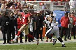 San Francisco 49ers quarterback Colin Kaepernick (7) throws against the Baltimore Ravens during the first half of an NFL football game in Santa Clara, Calif., Sunday, Oct. 18, 2015. (AP Photo/Ben Margot)