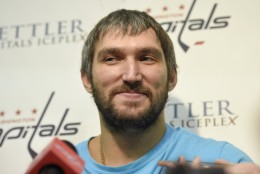 Washington Capitals left wing Alex Ovechkin, of Russia, talks with the press during media day at NHL hockey training camp, Friday, Sept. 18, 2015, in Arlington, Va. (AP Photo/Nick Wass)