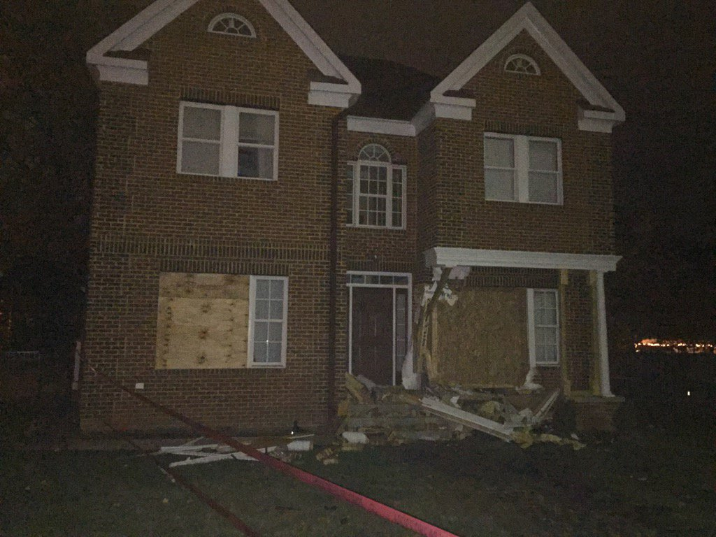 The car was eventually removed and boarded up. (WTOP/Kristi King)