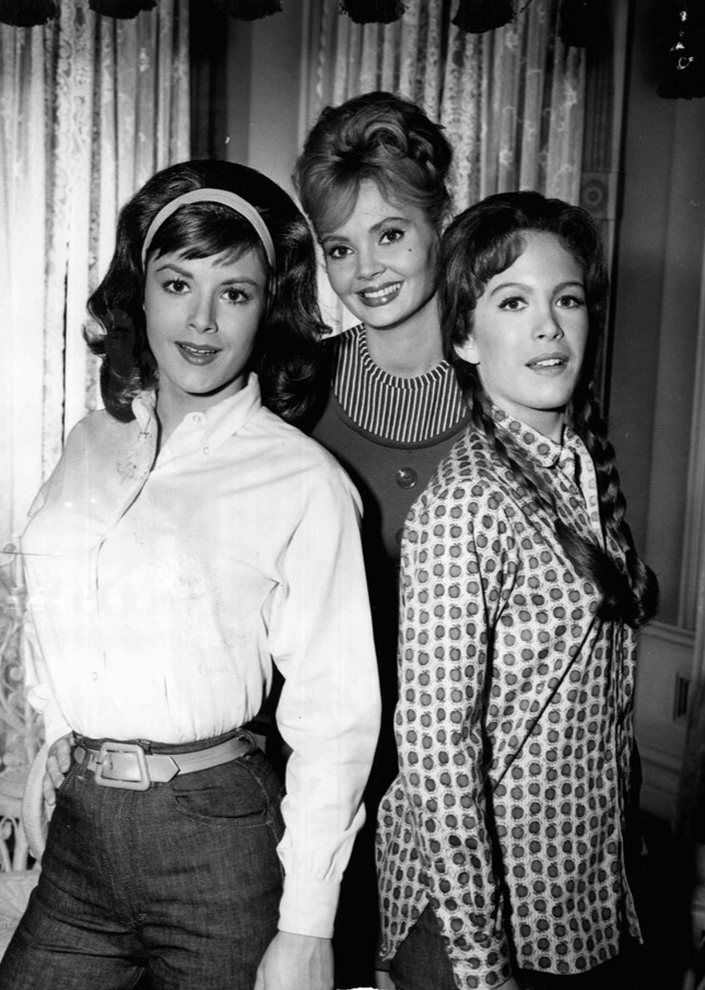 Photo of the Bradley sisters from the television program Petticoat Junction. From left-Pat Woodell (Bobbie Jo), Jeannine Riley (Billie Jo) and Linda Kaye (Betty Jo). Woodell died Sept. 29, 2015. By CBS Television (eBay item photo front photo back) [Public domain], via Wikimedia Commons