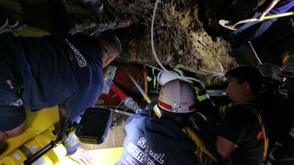 Man buried to chest rescued from trench in Howard County