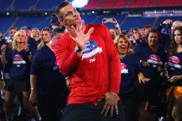 FOXBORO, MA - SEPTEMBER 28:  Rob Gronkowski #87 of the New England Patriots dances with clinic participants during The Rob Gronkowski Football 101 Women's Clinic at Gillette Stadium on September 28, 2015 in Foxboro, Massachusetts. The clinic aimed to teach women fundamental football skills and rules of the game.   (Photo by Maddie Meyer/Getty Images)