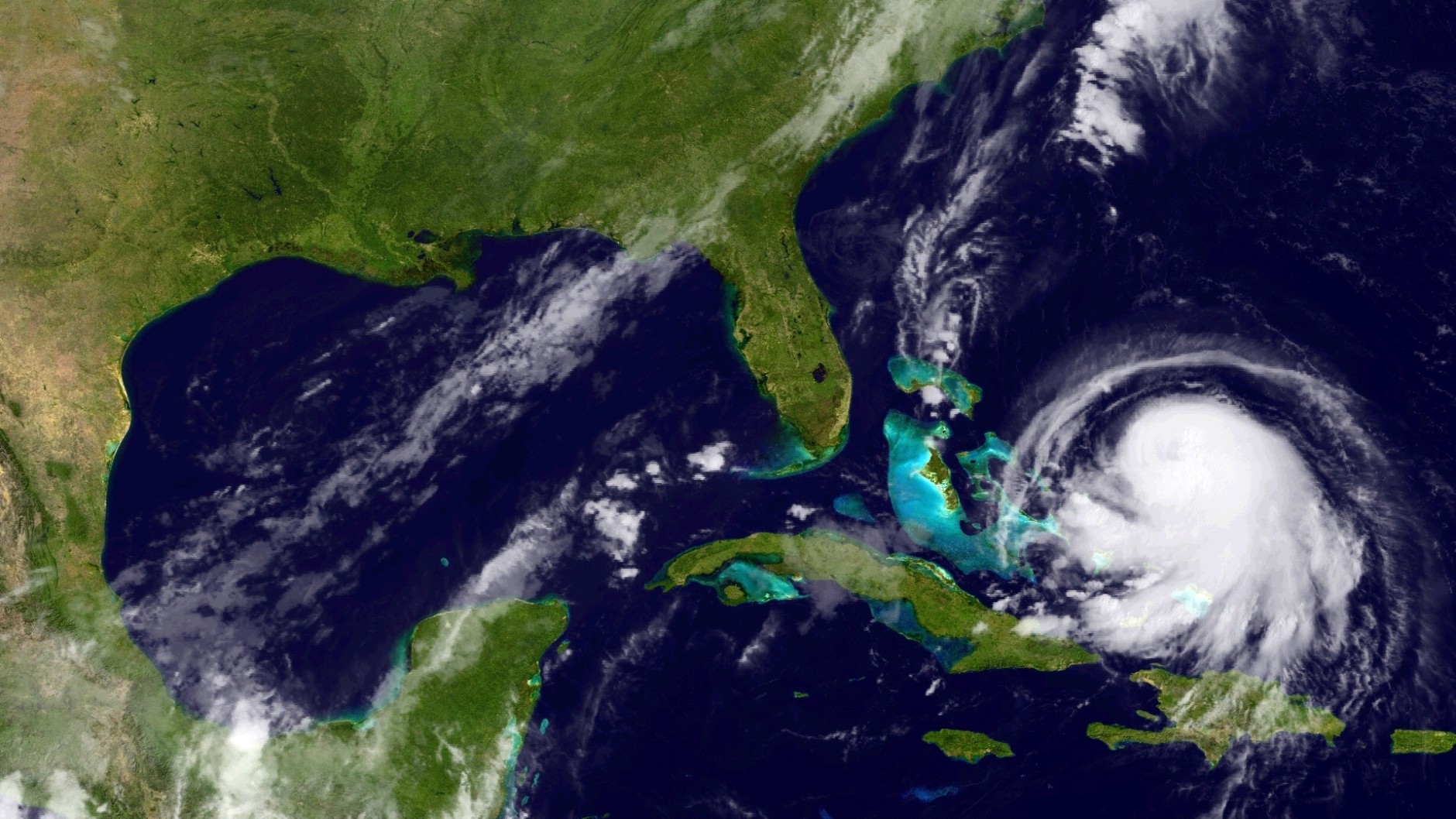 IN SPACE - SEPTEMBER 30:  In this handout from the National Oceanic and Atmospheric Administration (NOAA), Hurricane Joaquin is seen chruning in the Caribbean September 30, 2015. Joaquin was upgraded to a category 1 hurricane early on September 30. The exact track has yet to be determined, but there is a  possibity of landfall in the U.S. anywhere from North Carolina to the Northeast.  (Photo by NOAA via Getty Images)