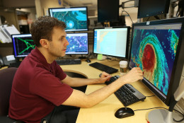MIAMI, FL - OCTOBER 01:  Eric Blake, Hurricane Specialist, uses a computer at the National Hurricane Center to track the path of Hurricane Joaquin, a Category 3 storm with maximum sustained winds of 125 mph, as it passes over parts of the Bahamas on October 1, 2015 in Miami, Florida. The National Hurricane Center forecasters are still trying to determine if the hurricane will turn to the north and northwest, which might affect the U.S. East Coast.  (Photo by Joe Raedle/Getty Images)