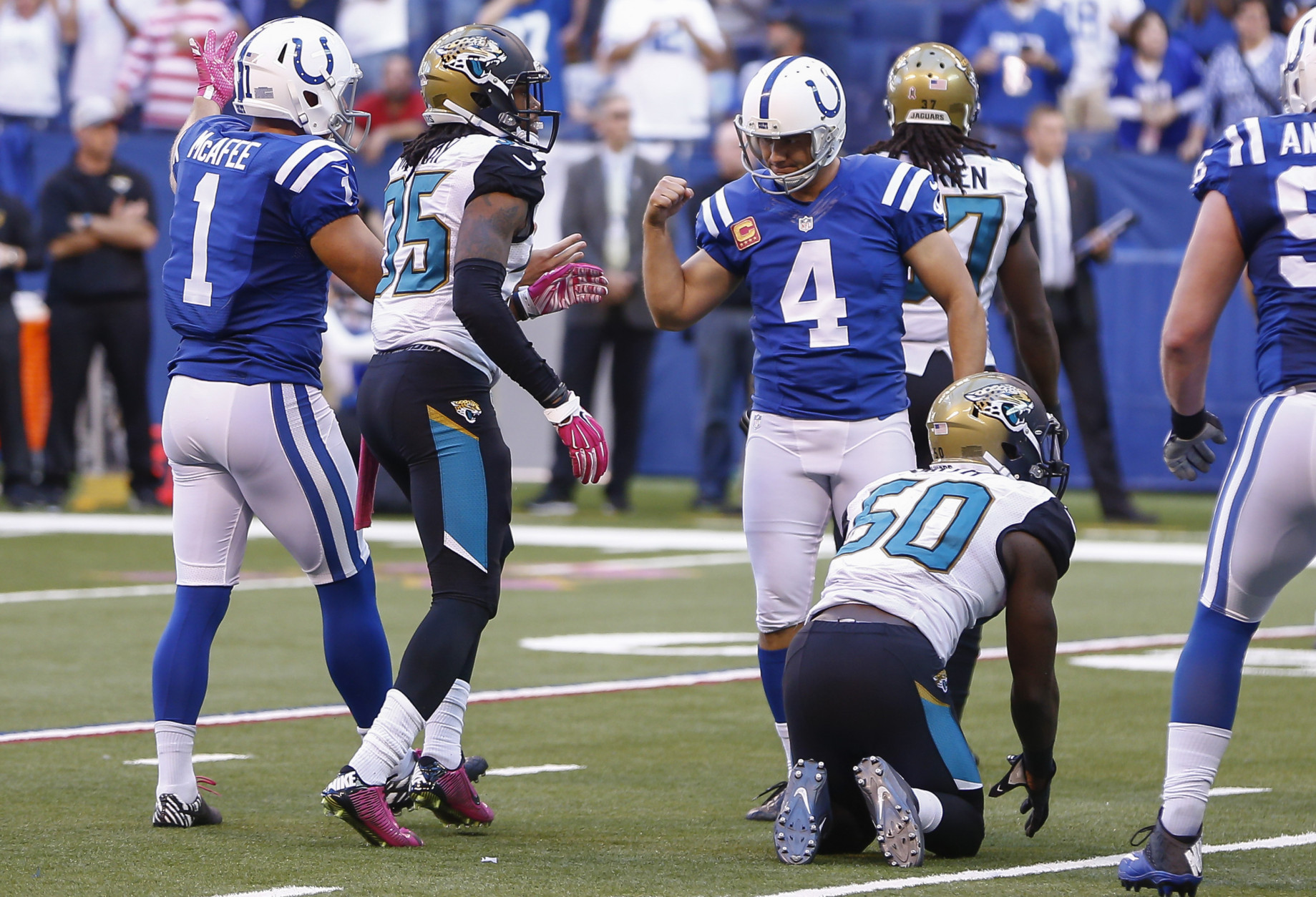 INDIANAPOLIS, IN - OCTOBER 4: Pat McAfee #1 and Adam Vinatieri #4 of the Indianapolis Colts react after the game winning field goal against the Jacksonville Jaguars at Lucas Oil Stadium on October 4, 2015 in Indianapolis, Indiana. Indianapolis defeated Jacksonville 16-13. (Photo by Michael Hickey/Getty Images)
