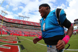 TAMPA, FL - OCTOBER 04:  Cam Newton #1 of the Carolina Panthers runs across the field after the game against the Tampa Bay Buccaneers at Raymond James Stadium on October 4, 2015 in Tampa, Florida.  (Photo by Rob Foldy/Getty Images)