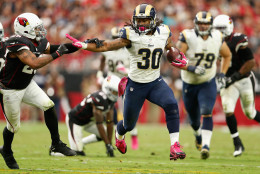 GLENDALE, AZ - OCTOBER 04: Running back Todd Gurley #30 of the St. Louis Rams runs past free safety Rashad Johnson #26 of the Arizona Cardinals during the second half of the NFL game at the University of Phoenix Stadium on October 4, 2015 in Glendale, Arizona.  (Photo by Christian Petersen/Getty Images)
