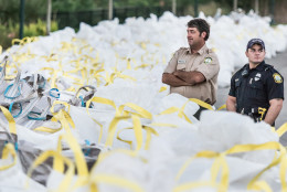COLUMBIA, SC - OCTOBER 6:  Emergency personnel look out over sandbags at the breach in the Columbia Canal on October 6, 2015 in Columbia, South Carolina. The state of South Carolina experienced record rainfall amounts over the weekend and continues to face resulting flooding. (Photo by Sean Rayford/Getty Images)