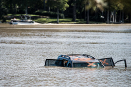 COLUMBIA, SC - OCTOBER 6:  A car is submerged in Lake Katherine October 6, 2015 in Columbia, South Carolina. The state of South Carolina experienced record rainfall amounts over the weekend and officials expect the costs to be in the billions. (Photo by Sean Rayford/Getty Images)