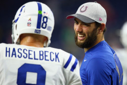 HOUSTON, TX - OCTOBER 08:   Andrew Luck #12 of the Indianapolis Colts, right talks with Matt Hasselbeck #8 before a game against the Houston Texans at NRG Stadium on October 8, 2015 in Houston, Texas.  (Photo by Ronald Martinez/Getty Images)