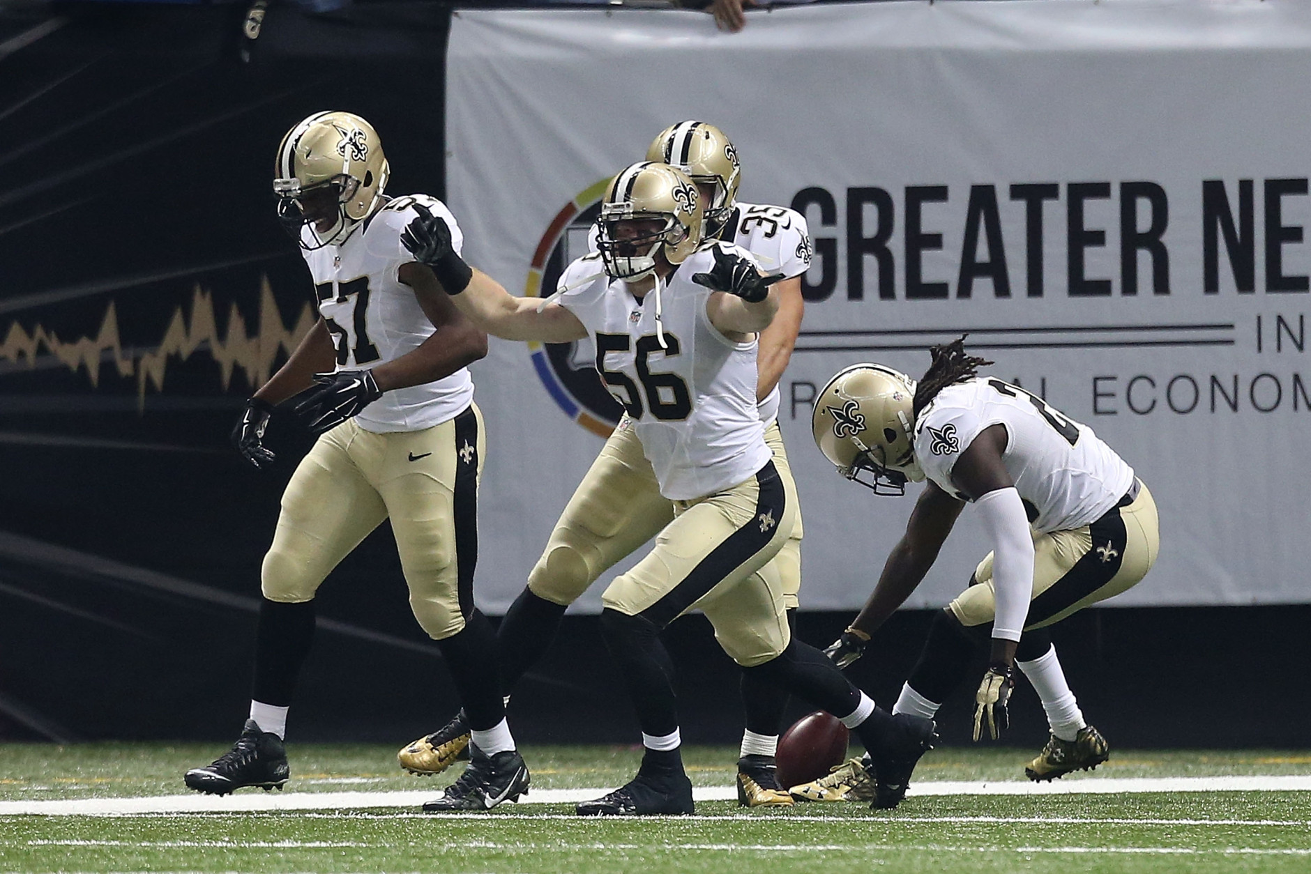 NEW ORLEANS, LA - OCTOBER 15:  Michael Mauti #56 of the New Orleans Saints reacts to a touchdown folllowing a blocked punt during the first quarter of a game against the Atlanta Falcons at the Mercedes-Benz Superdome on October 15, 2015 in New Orleans, Louisiana.  (Photo by Sean Gardner/Getty Images)