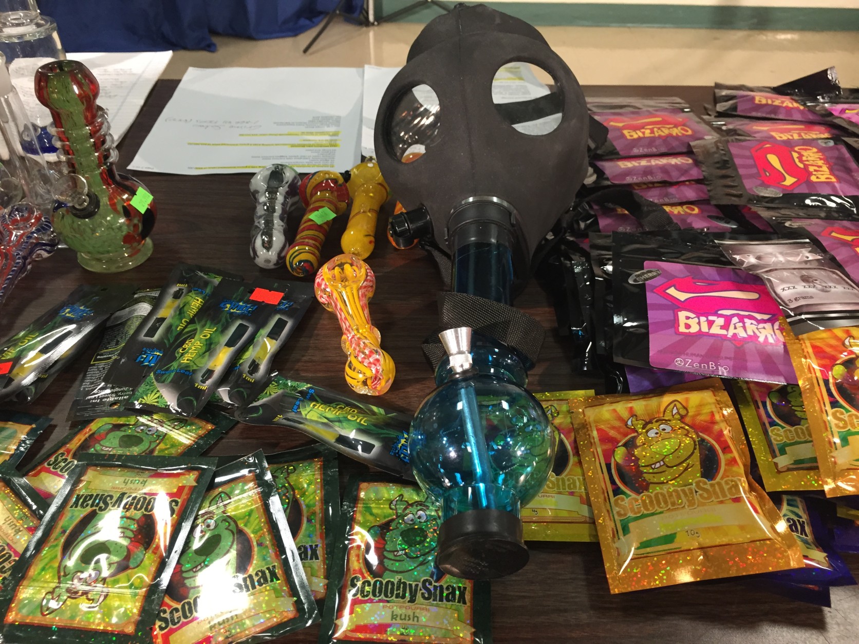 The colorful packets include cartoon figures and benign names, such as “Scooby Snax.” (WTOP/Andrew Mollenbeck)