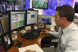 NBC 4 Chief Meteorologist Doug Kammerer at his desk. He and the station's other meteorologists are in the process of working up a winter weather forecast that they'll release in early November. (WTOP/Michelle Basch)