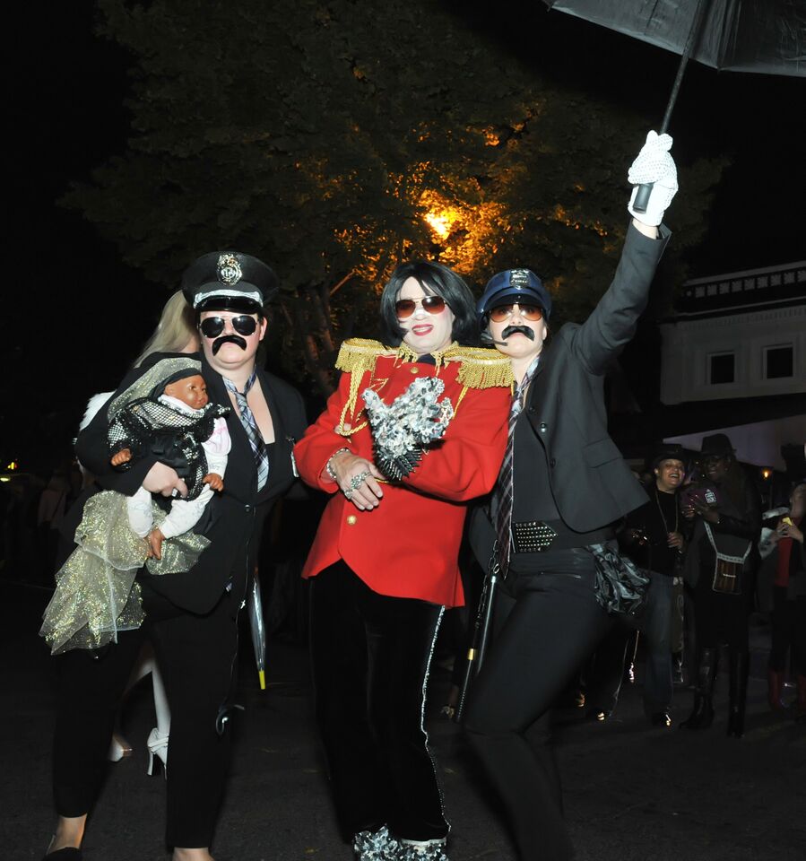 A participant dressed as Michael Jackson -- with son Blanket -- for the 2015 High Heel Race. (Courtesy Shannon Finney, www.shannonfinneyphotography.com)