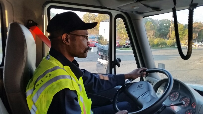 Snowplow driver Ronald Terrell reminds Prince George's County residents to park on the even-numbered side of the street during a snow event to make way for plows. (WTOP/Kathy Stewart)