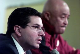 Washington Redskins owner Daniel Snyder, left, announces at Redskin Park in Ashburn, Va. Monday, Dec. 4, 2000, that coach Norv Turner had been fired and that Terry Robiskie, right, would become interim coach. (AP Photo/Hillery Smith Garrison)