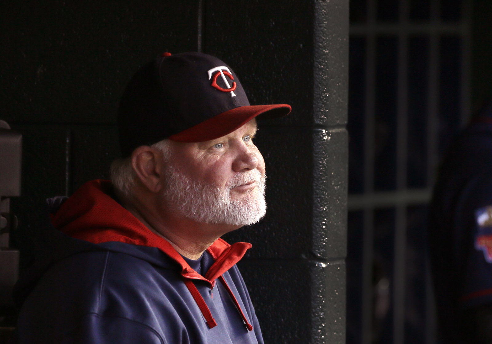 FILE - In this Saturday, Sept. 27, 2014, file photo, Minnesota Twins manager Ron Gardenhire sits in the dugout during the first inning of a baseball game against the Detroit Tigers in Detroit. The Twins fired Gardenhire on Monday, Sept. 29, 2014,  after 13 seasons that included at least 92 losses in each of the last four years. (AP Photo/Carlos Osorio, File)