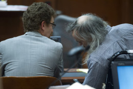 Charles Severance, right, talks with his defense attorney Joe King during trial at the Fairfax County Circuit County, in Fairfax, Va., Wednesday, Oct. 21, 2015. Severance is accused of three murders over the course of a decade in Alexandria, Va.  (AP Photo/Cliff Owen, Pool)