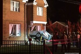 A driver and a passenger were killed when a car crashed into a house in Alexandria, Virginia on Oct. 27, 2015. (Courtesy NBC Washington/Shomari Stone)
