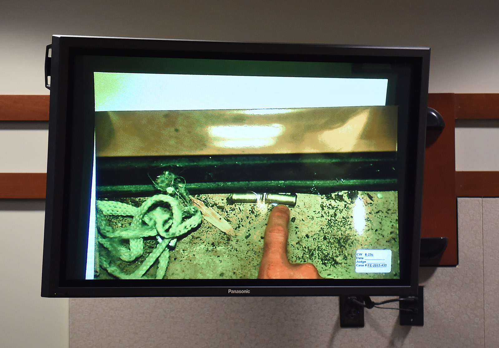 A photo of shell casings that were obtained during a search are displayed during the Charles Severance trial in Fairfax County Circuit Court on Tuesday October 13, 2015 in Fairfax, VA. Severance is accused of three murders over the course of a decade in Alexandria, VA. (Pool Photo by Matt McClain/ The Washington Post)