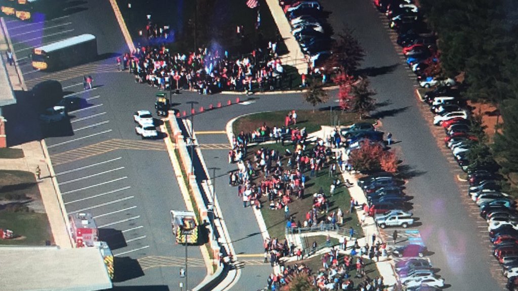 Students are seen outside of W.T. Woodson High School where a fire occurred. (Courtesy NBC Washington)