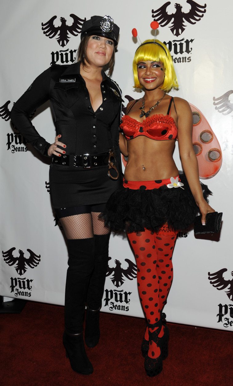 Khloe Kardashian, left, and Christina Milian pose together at the Pur Jeans Halloween Bash in Los Angeles, Friday, Oct. 31, 2008. (AP Photo/Chris Pizzello)