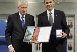 FILE - In this Dec. 10, 2009, file photo, President and Nobel Peace Prize laureate Barack Obama poses with his medal and diploma alongside Nobel committee chairman Thorbjorn Jagland at the Nobel Peace Prize ceremony at City Hall in Oslo, Norway. (AP Photo/John McConnico, File)