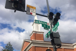 This new street sign, Ruby Whitfield Way, was unveiled on Sunday, Oct. 18, 2015. The street sign is named for Ruby Whitfield, who was struck and killed in 2013 while leaving New Samaritan Baptist Church. (WTOP/Dick Uliano) 