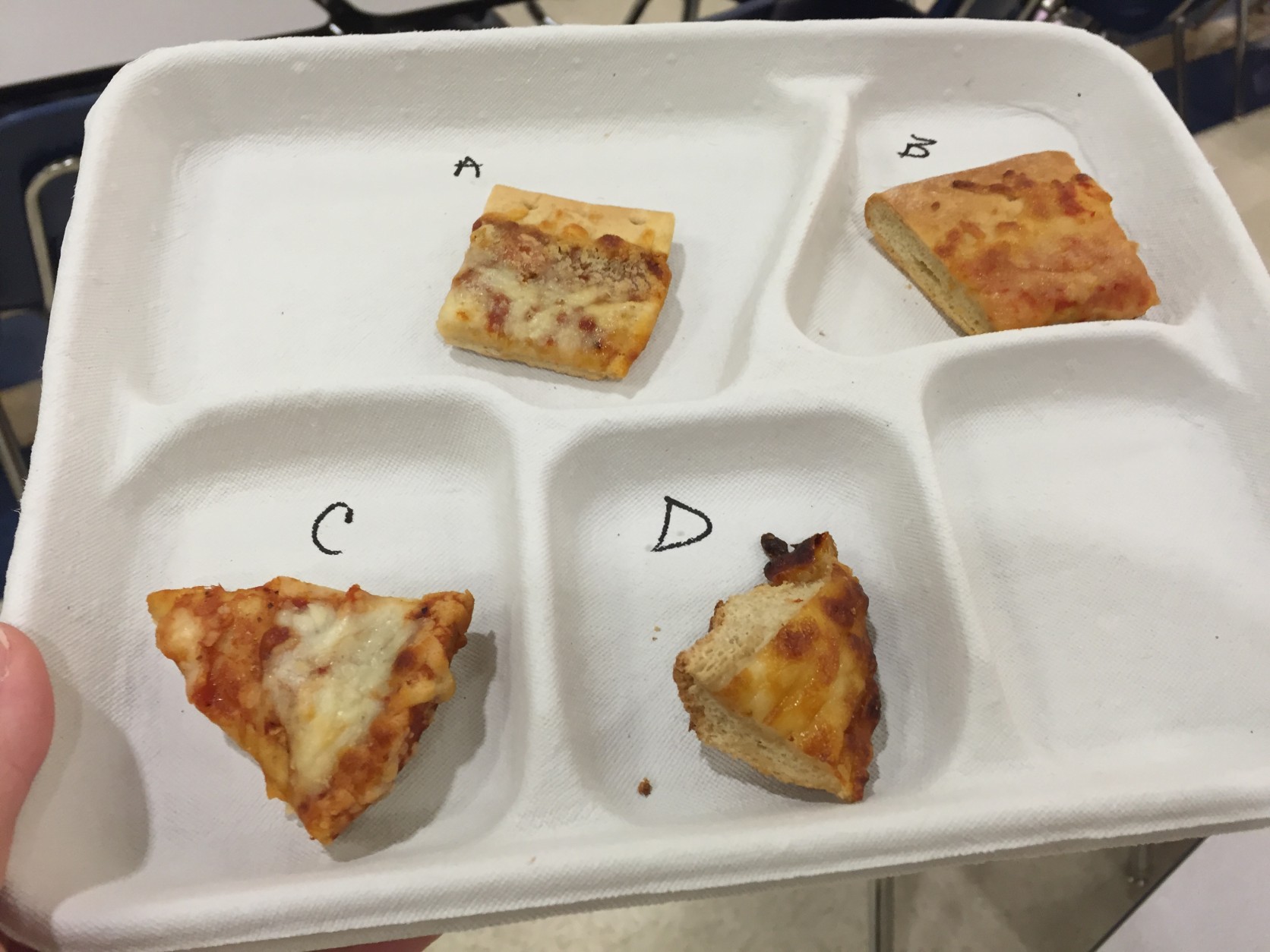 Here's what the different pizza samples looked like. Sample B was popular with taste-testers we talked to. Sample D was like garlic bread. (WTOP/Michelle Basch)