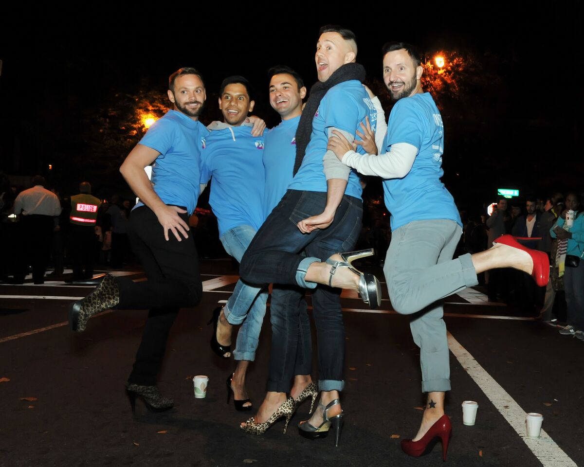 The High Heel Race volunteers get into the act. (Courtesy Shannon Finney, www.shannonfinneyphotography.com)