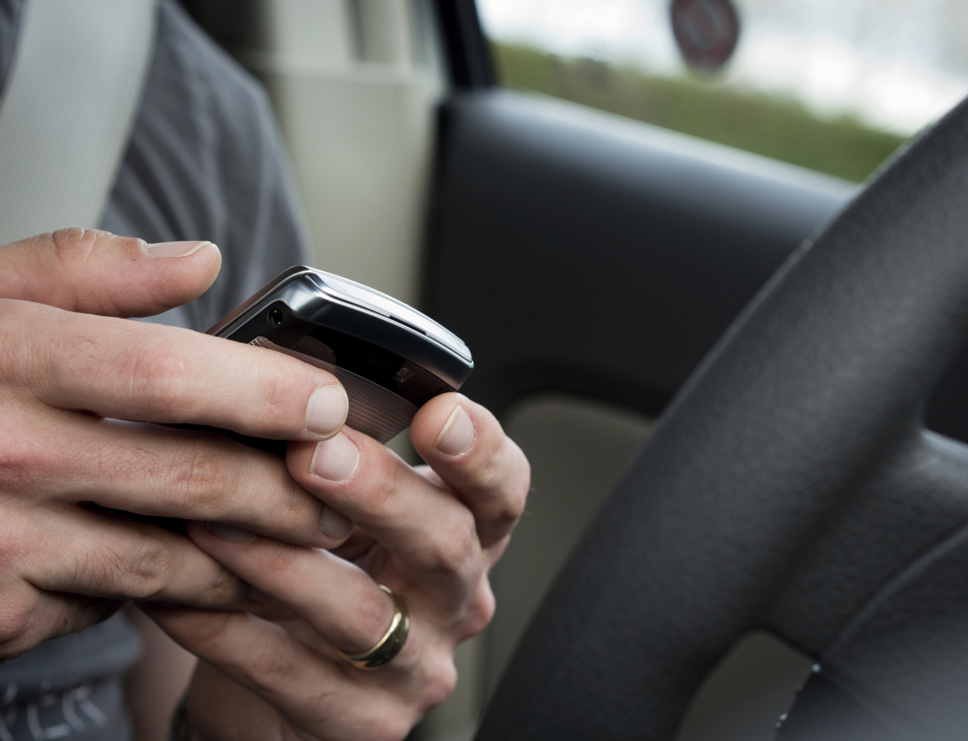 Survey compares distracted driving habits of teens and adults