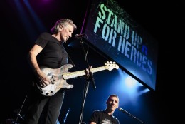 Musician Roger Waters performs with a band of wounded veterans during the Stand Up for Heroes event at Madison Square Garden on Nov. 6, 2013, in New York. Waters will play a similar event at the Music Heals concert Friday at D.A.R. Constitution Hall in Washington D.C. (John Minchillo/Invision/AP)