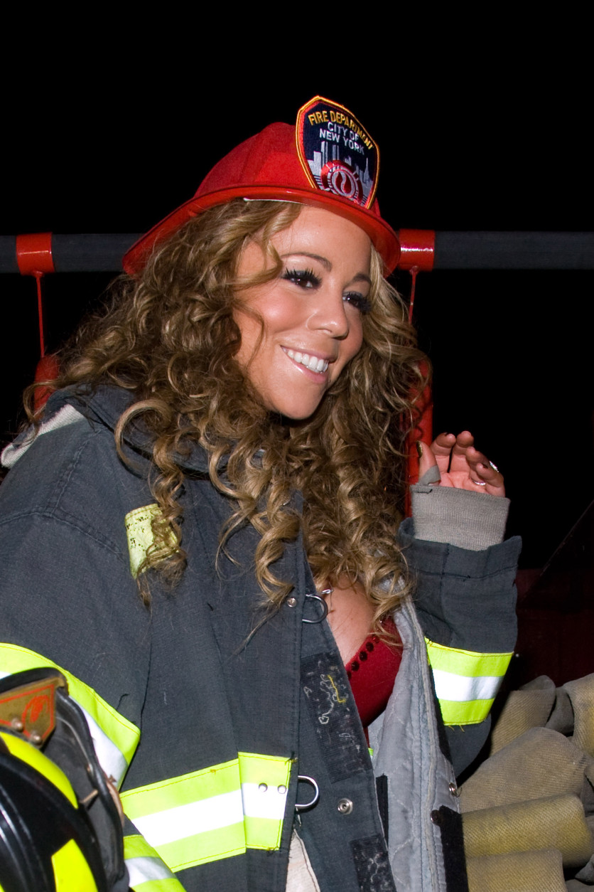 Mariah Carey arrives by firetruck to her Halloween party at Marquee,Thursday, Oct. 30, 2008, in New York. (AP Photo/Charles Sykes)