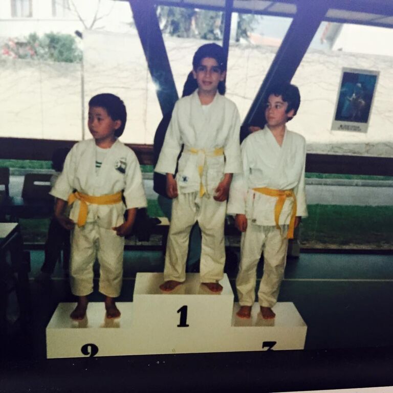 14.	A young Florent Groberg stands on the winner’s podium after winning a judo tournament in Paris, France, 1989. (Photo courtesy of Retired U.S. Army Capt. Florent Groberg)