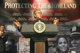 ** FILE ** President Bush makes remarks on Homeland Security at Oak Park High School in Kansas City, Mo., in this June 11, 2002 file photo. The name of the Department of Homeland Security is meant to evoke images of safety, even family, hearth, comfort. It gives some people a knot in the stomach. An uncommon word to begin with, "homeland" became an everyday word after the Sept. 11 attacks and was institutionalized when President Bush created the Office of Homeland Security. (AP Photo/Ron Edmonds, File)